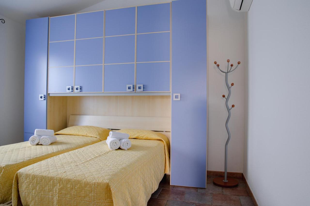 Le Residenze Di Baia Sant'Anna Vila Tanaunella Exterior foto