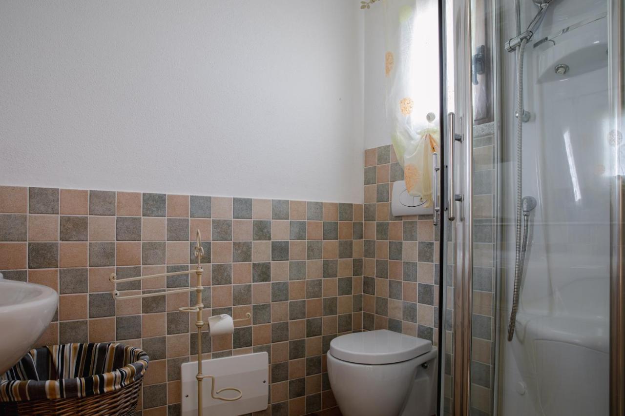 Le Residenze Di Baia Sant'Anna Vila Tanaunella Exterior foto