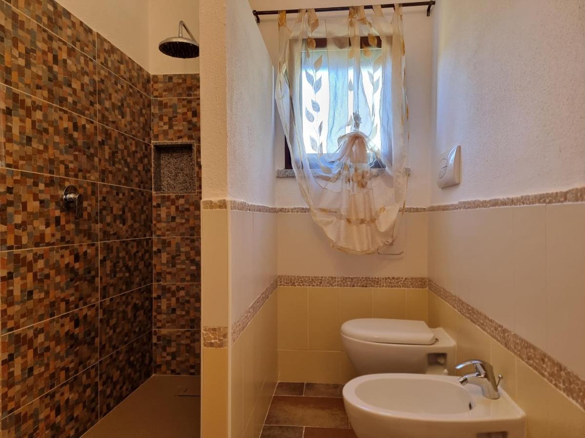 Le Residenze Di Baia Sant'Anna Vila Tanaunella Exterior foto